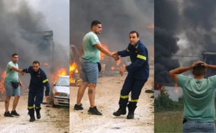 Πυροσβέστης παίρνει σηκωτό ιδιοκτήτη μάντρας αυτοκινήτων που τυλίγεται στις φλόγες
